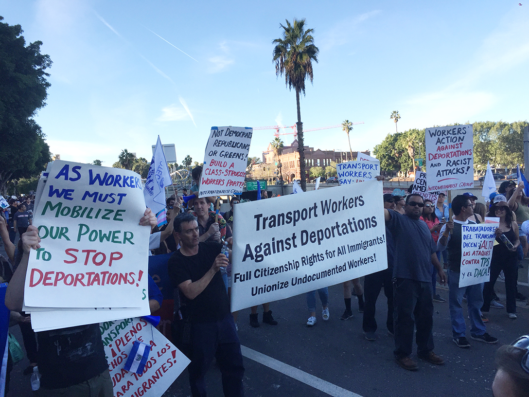 Contingent of "Transport Workers Against Deportations" at January 13 protest in Los Angeles against end of TPS (Temporary Protected Status) for 200,000 Salvadorans and threat of deportation against them Contingente de "Trabajadores del Transporte Contra las Deportaciones" en la manifestación del 13 de enero en Los Angeles contra la amenza de deportación de 200.000 salvadoreños tras el fin de su "estatus de protección temporal".
