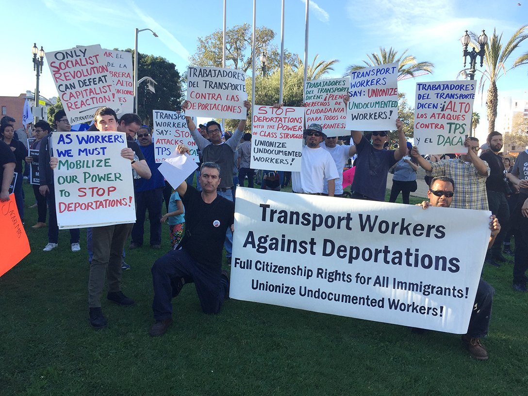 Contingent of "Transport Workers Against Deportations" at January 13 protest in Los Angeles against end of TPS (Temporary Protected Status) for 200,000 Salvadorans and threat of deportation against them Contingente de "Trabajadores del Transporte Contra las Deportaciones" en la manifestación del 13 de enero en Los Angeles contra la amenza de deportación de 200.000 salvadoreños tras el fin de su "estatus de protección temporal".